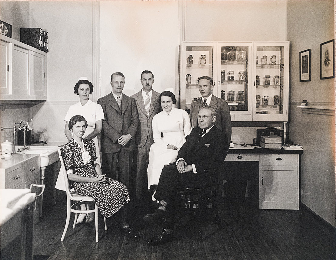 multidisciplinary team of doctors and nurses in an OB-GYN clinic in 1938